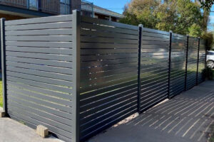 an aluminium slat pool fence 