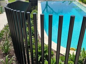 tubular blade style fencing for a pool