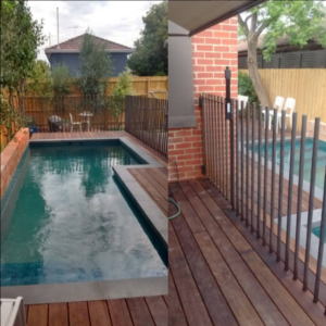 recycled wrought iron fence around a pool